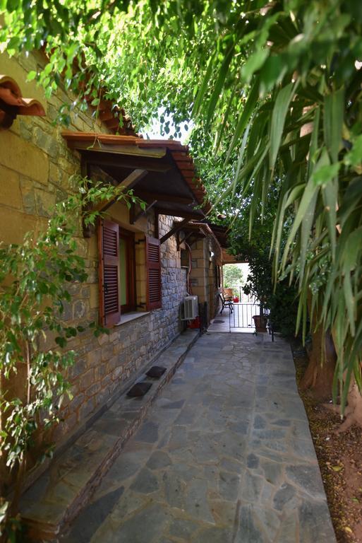 Villa Onar A Stone House With Amazing View Stoupa Bagian luar foto